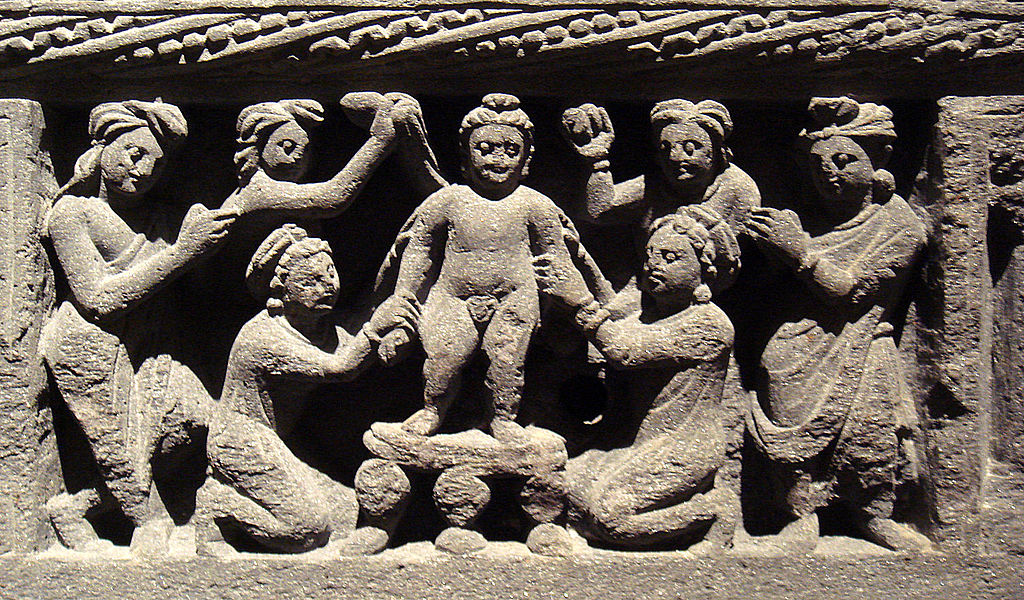 1024px-InfantBuddhaTakingABathGandhara2ndCenturyCE.jpg