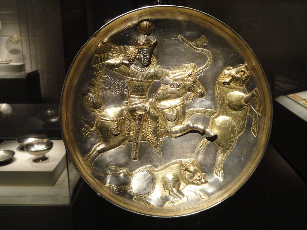 1024px-Plate_with_Shapur_II_in_hunting_scene,_view_1,_Iran,_Sasa.jpg