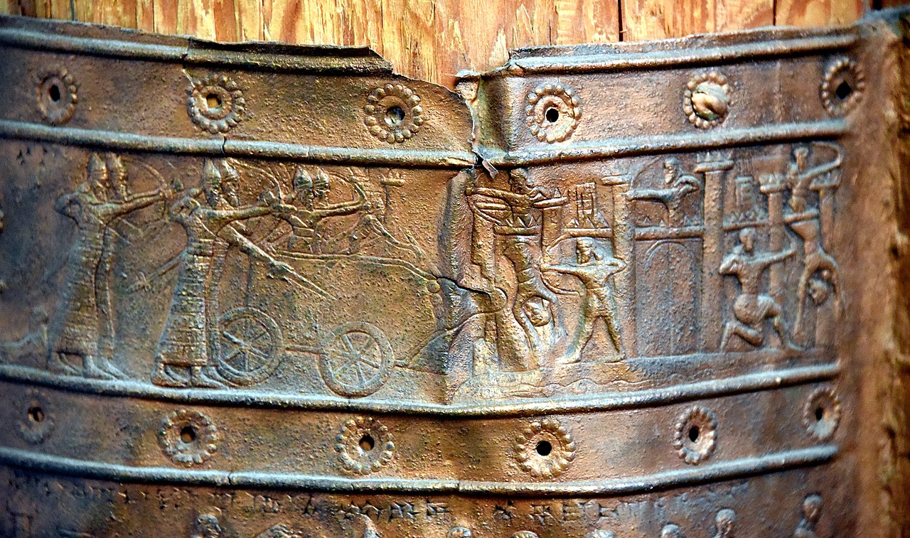 1280px-Balawat_gate,_bronze_band,_detail,_9th_century_BCE,_from_Balawat.jpg