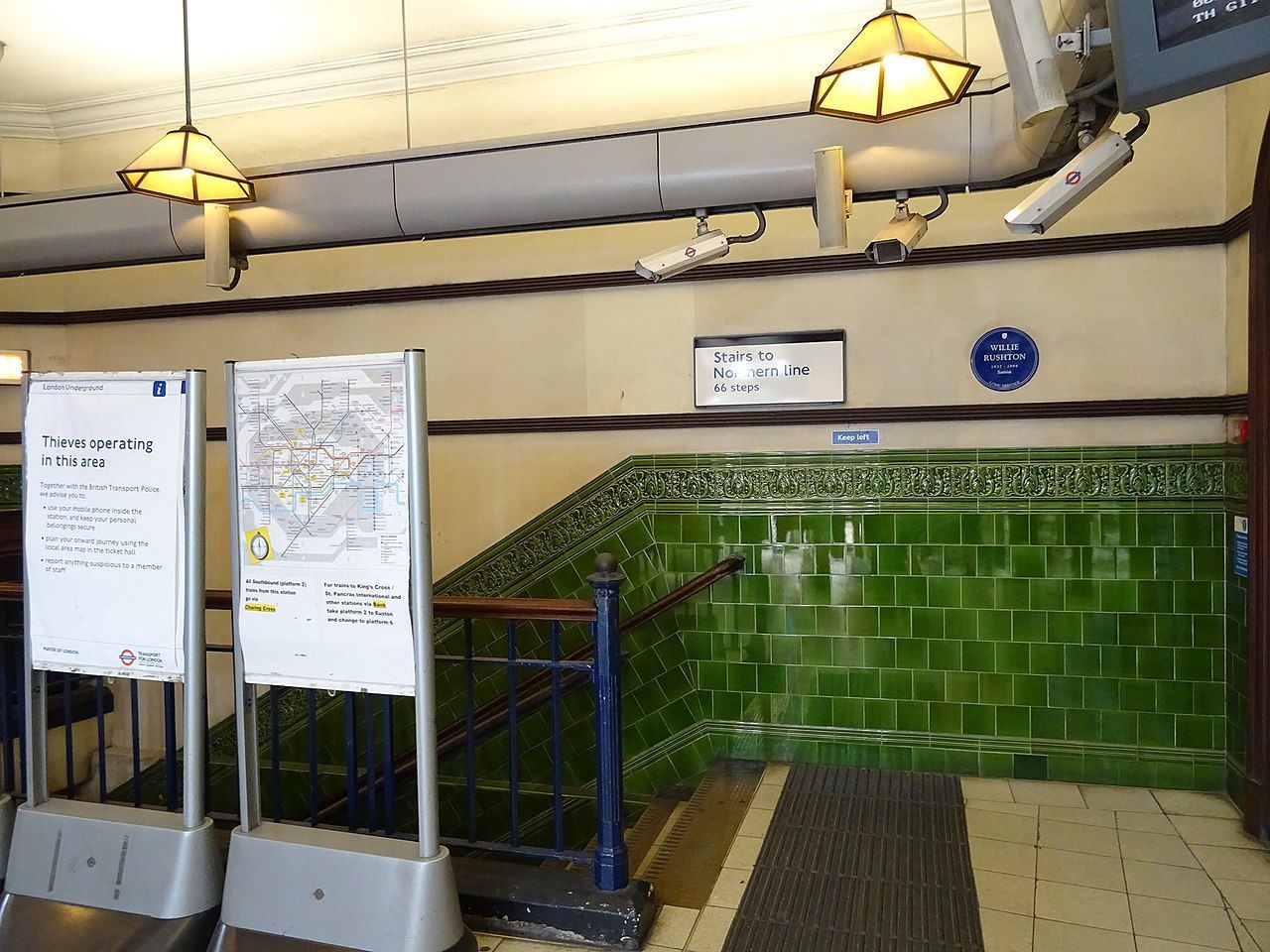 7 1280px-Willie_Rushton_-_Mornington_Crescent_station_plaque_(Comic_Heritage).jpg