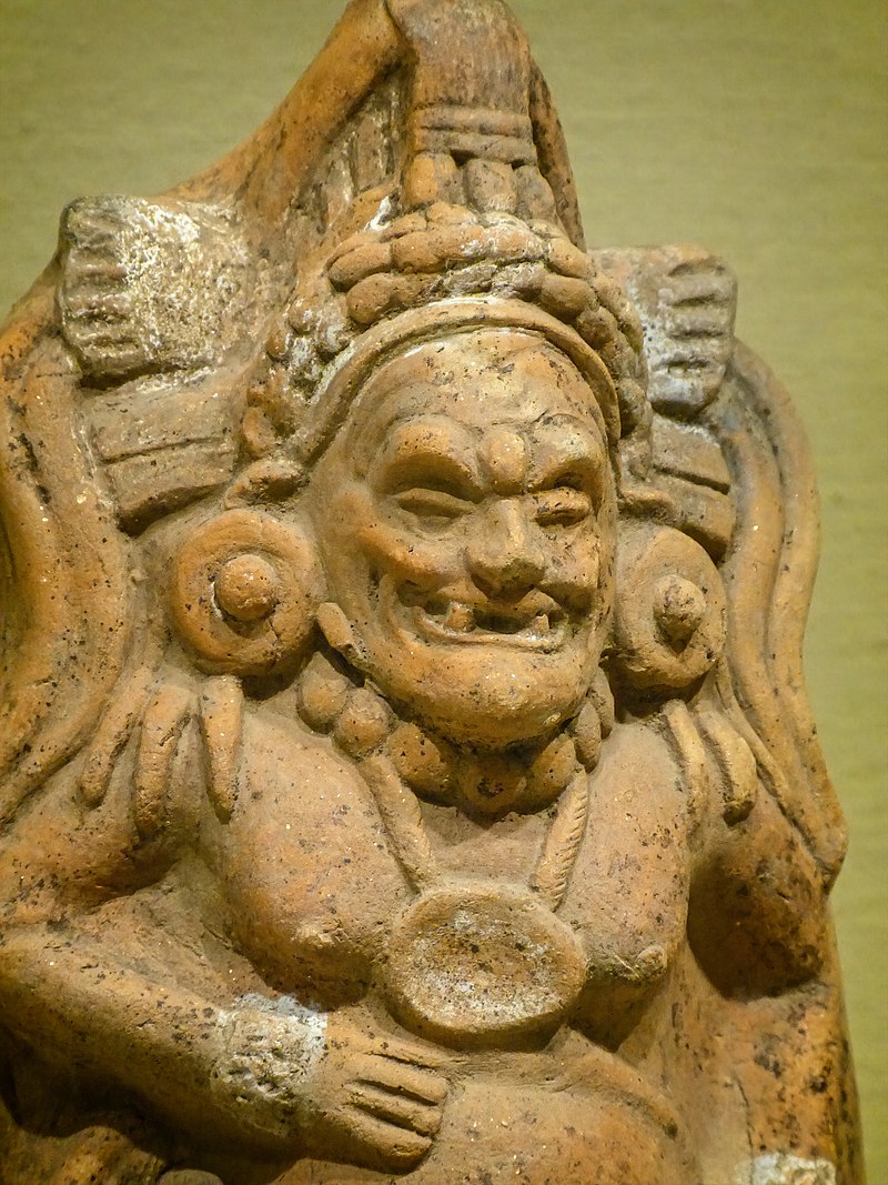 800px-Closeup_of_Seated_Male_Whistle_Figure_Maya_600-900_CE_(2).jpg
