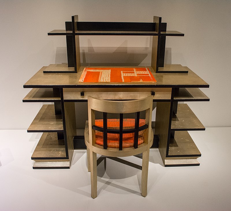 800px-Desk_bookcase_chair_and_blotter_-_Paul_Frankl_Paul_Rodier_(27986690909).jpg