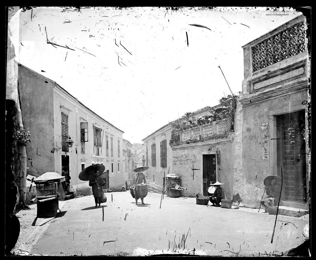 A street (Rua de São Paulo) in Macao, China. Photograph by John Thomson, 1870.jpg