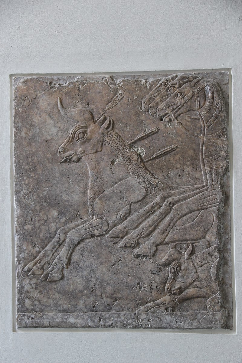 Alabaster_Relief_Fragment_of_Bull-Hunting_from_Palace_at_Nimrud,_883-859_BC.jpg
