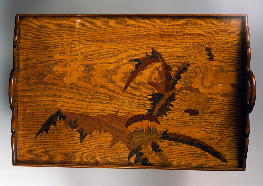 Emile_Galle_-_Wooden_tray_inlaid_with_thistle_decoration_Made_by_Emile_Galle_(1846-1904)_.jpg