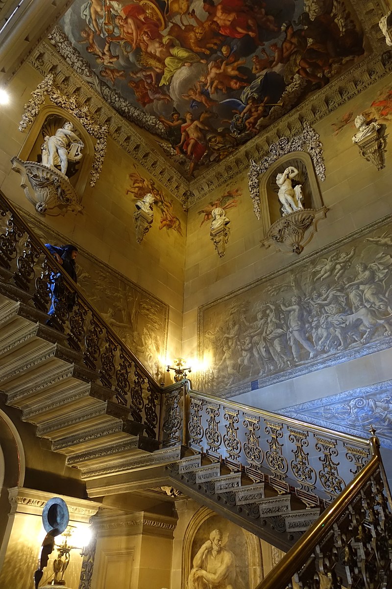 Great_Staircase,_ceiling_painted_by_Antonio_Verrio,_1691,_statues_by_Caius_Gabriel_Cibber,_.jpg