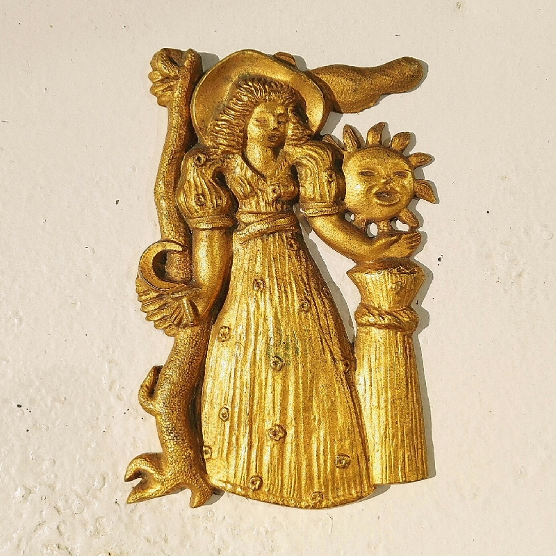 plaque-bronze-vadim-androusov-dore-femme-soleil-.jpg